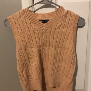 tan sweater vest